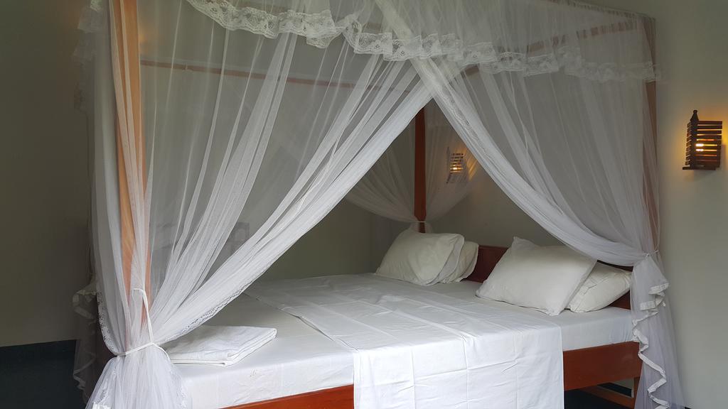 Sweden Inn Guesthouse ฮิกคาดูวา ห้อง รูปภาพ