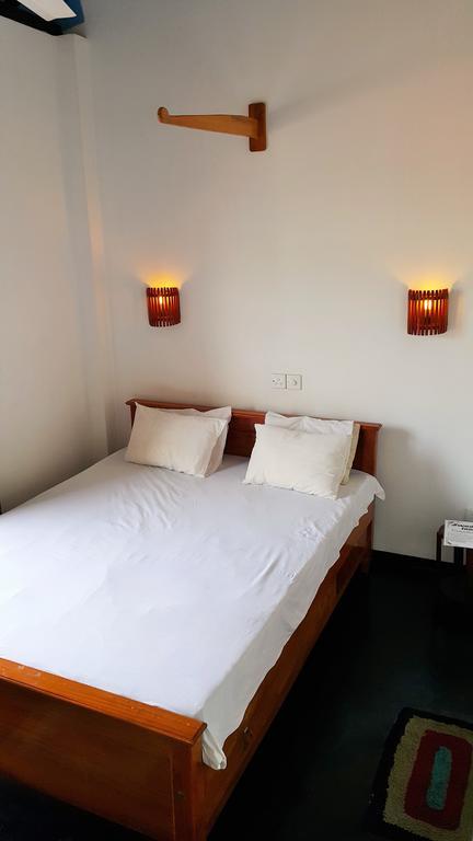 Sweden Inn Guesthouse ฮิกคาดูวา ห้อง รูปภาพ