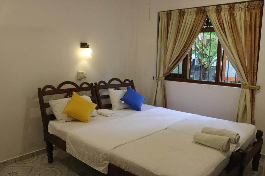 Sweden Inn Guesthouse ฮิกคาดูวา ห้อง รูปภาพ